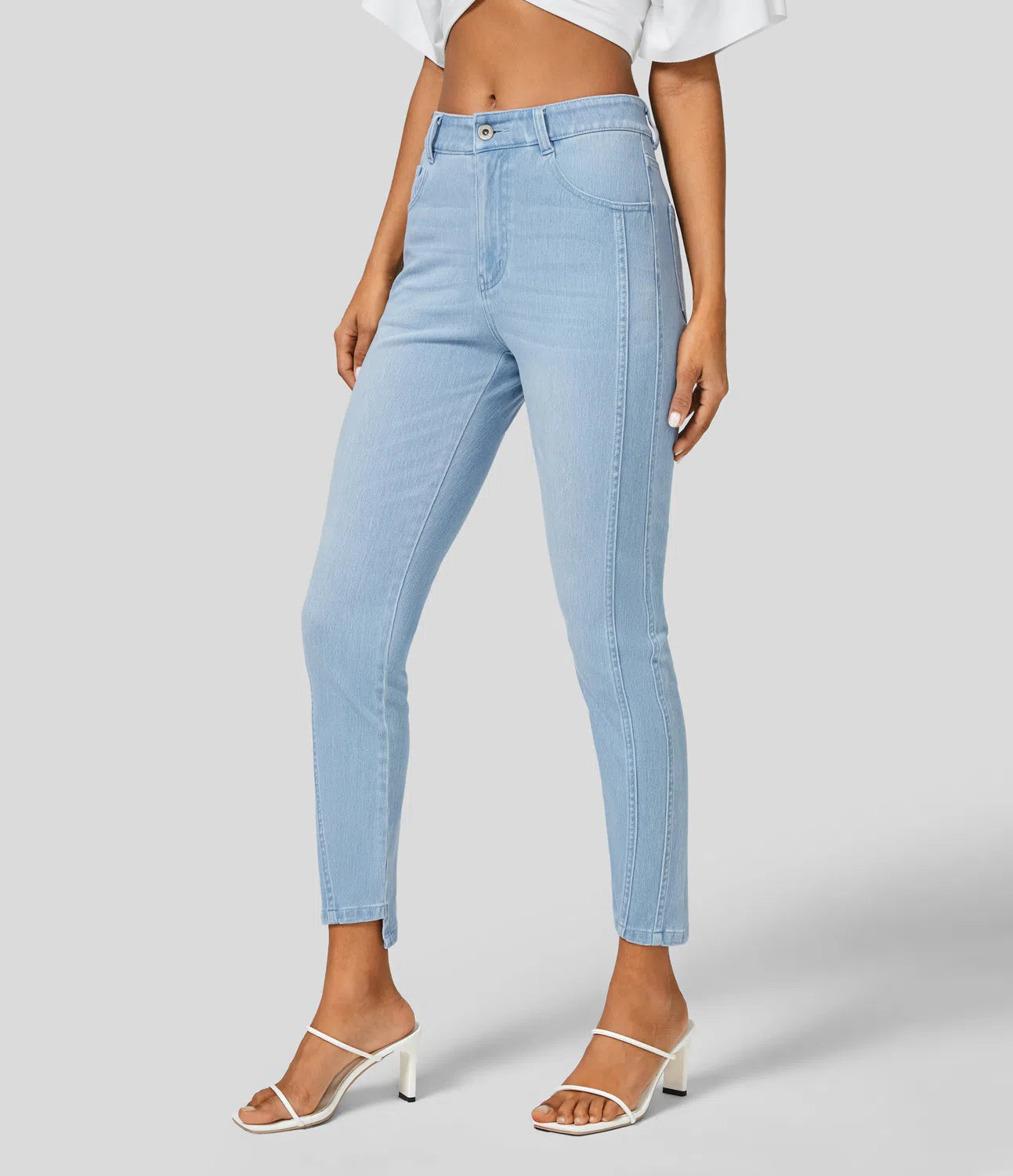 Mittlere Leibhöhe, Knopfverschluss, Reißverschluss, Mehrere Taschen, Dehnbare Strickjeans, Lässige Röhrenpassform.