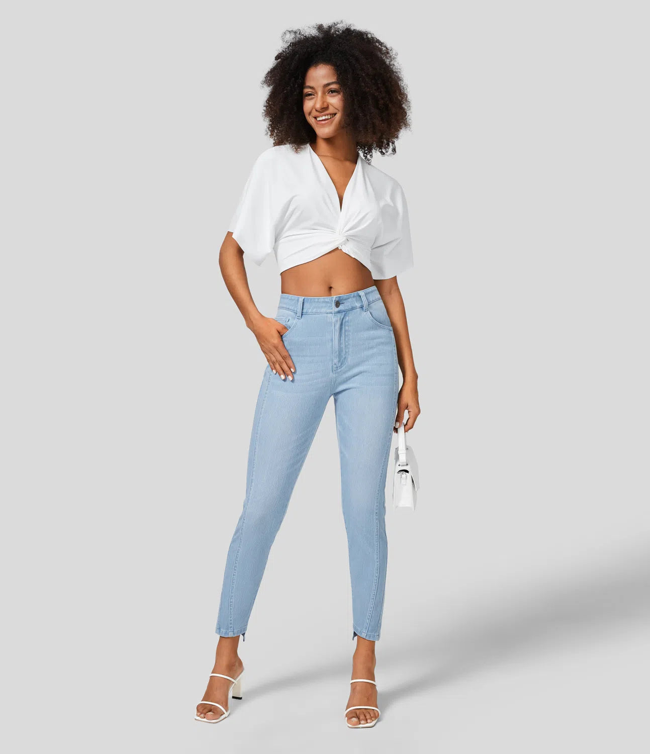 Mittlere Leibhöhe, Knopfverschluss, Reißverschluss, Mehrere Taschen, Dehnbare Strickjeans, Lässige Röhrenpassform.