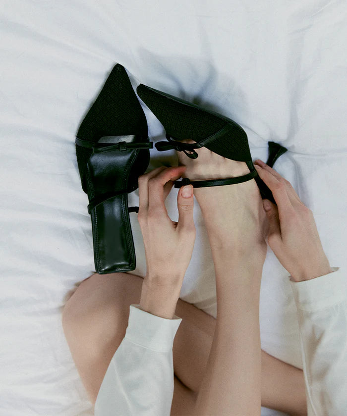 Bowtention spitze Mules mit Absatz